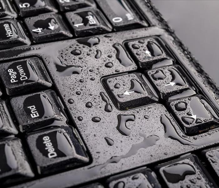 keyboard with water on it