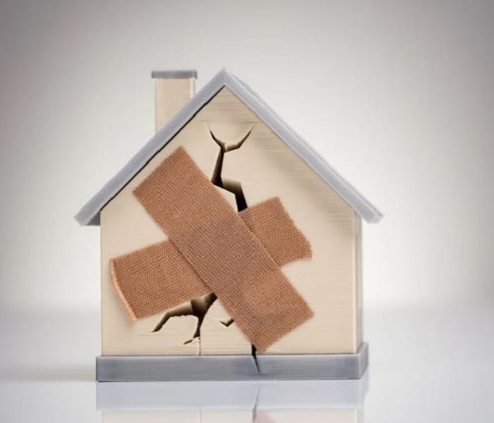 Why Choose SERVPRO - image of small house with Band-Aids over it